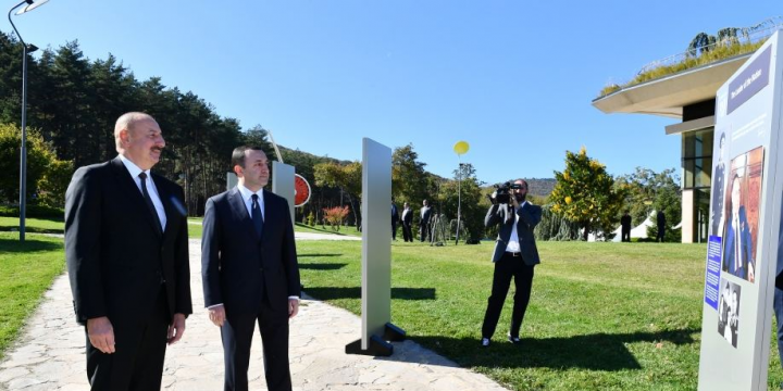 President Ilham Aliyev and Prime Minister Irakli Garibashvili viewed photo exhibition dedicated to 100th anniversary of National Leader Heydar Aliyev in Tbilisi 