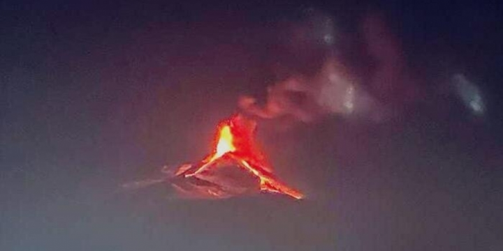 Etna erupts again, sending hot lava down its snowy slopes