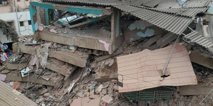 A 3-story building collapses in central Pakistan, killing 9 people and injuring 2 others