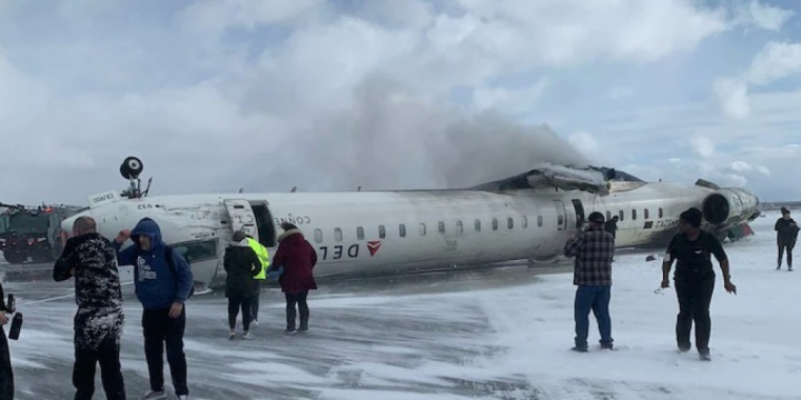 18 people injured after Delta plane flips upside down on landing at Toronto airport